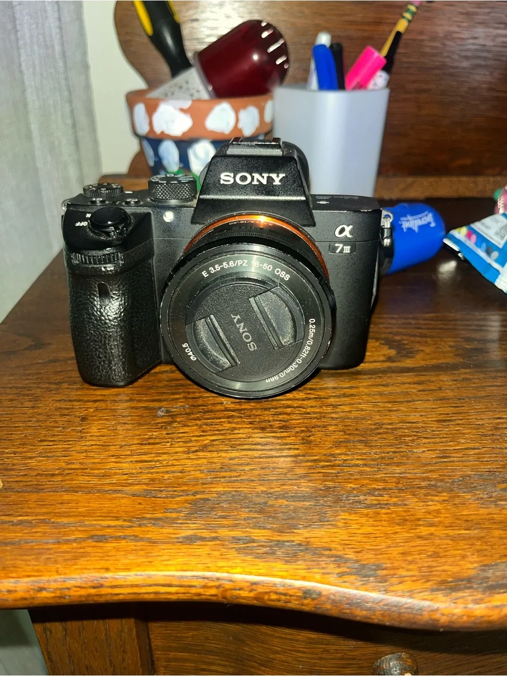 Sony Alpha 7 III Mirrorless Camera in Black with Orange Lens Ring